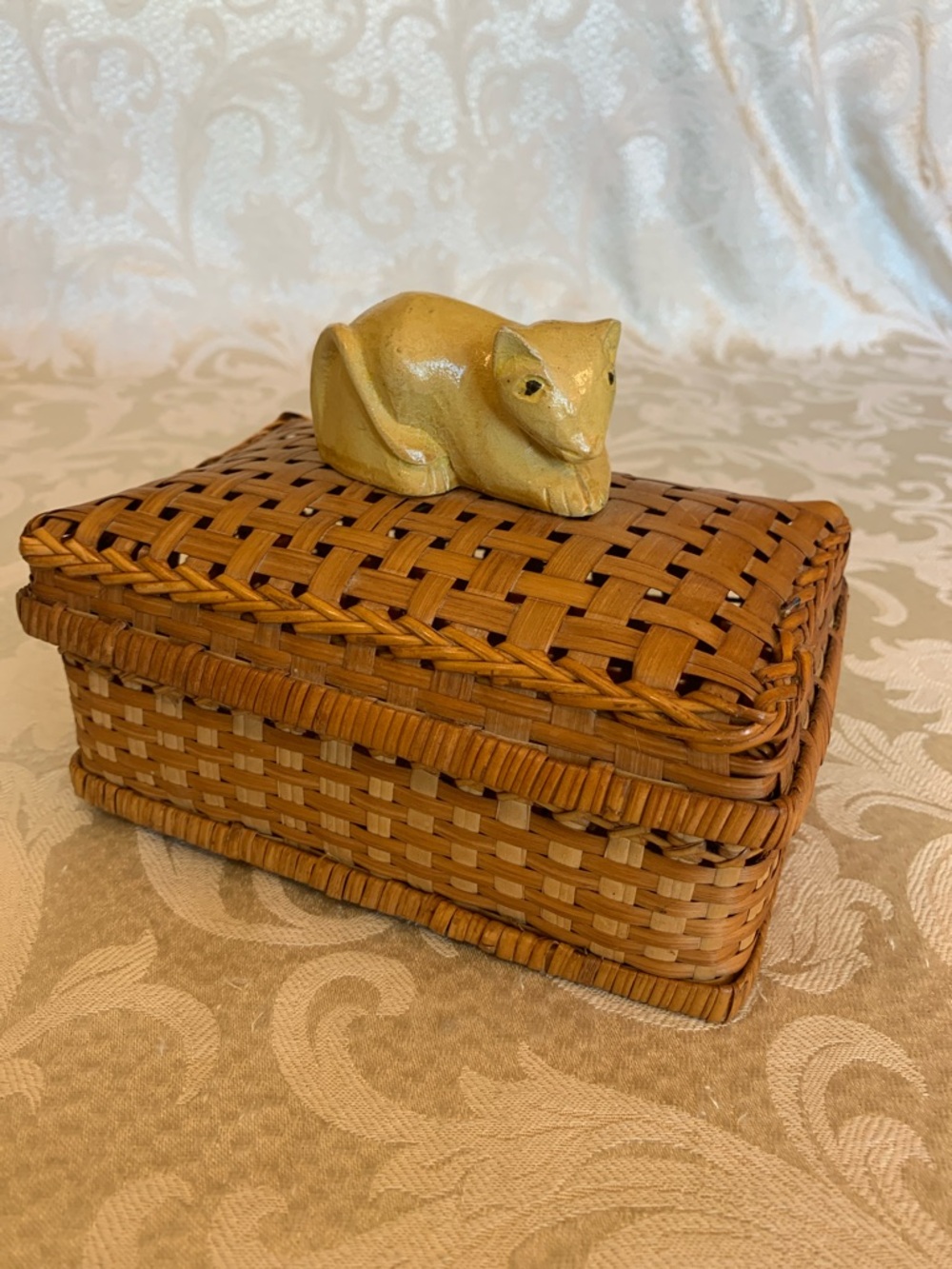 Handwoven Tan Wicker Storage Box with Yellow Ceramic Cat  Accent